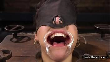 Brunette slave gets hose over face
